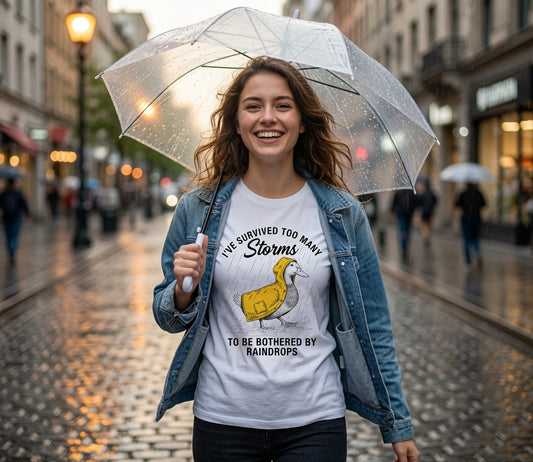 Survived Too Many Storms Duck Tee | Humorous Raincoat Duck Illustration