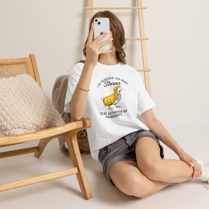 Survived Too Many Storms Duck Tee | Humorous Raincoat Duck Illustration