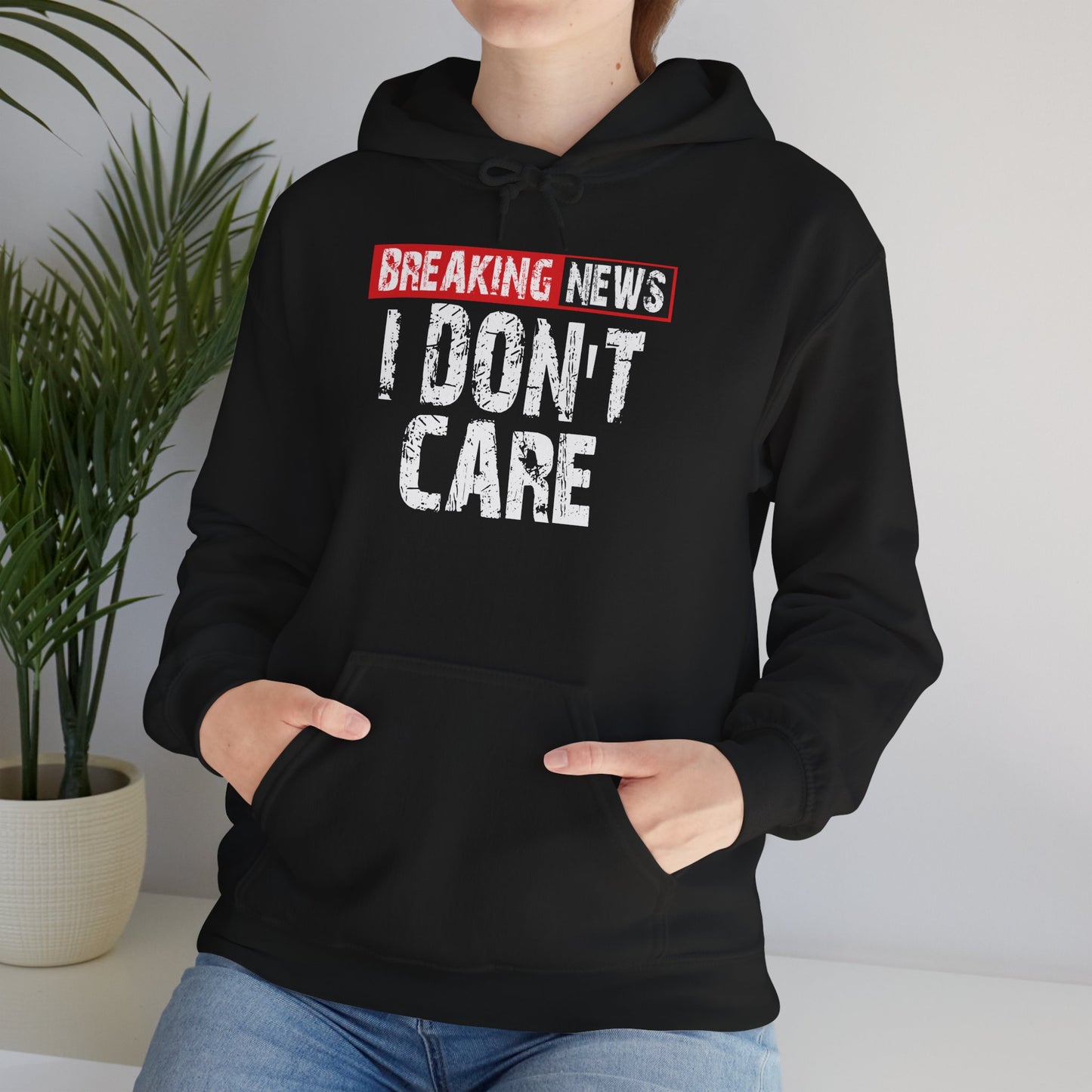 Breaking News I Don't Care Hoodie | Graphic Text Pullover