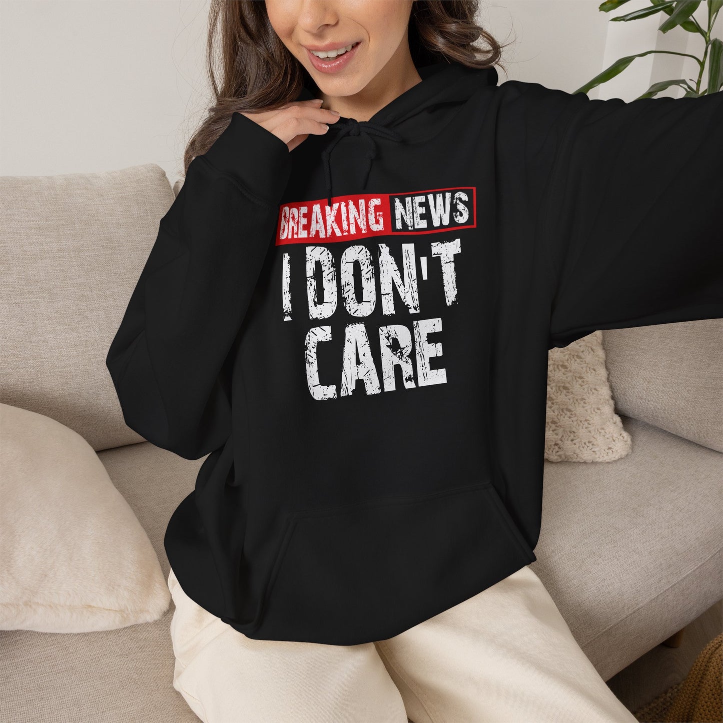 Breaking News I Don't Care Hoodie | Graphic Text Pullover